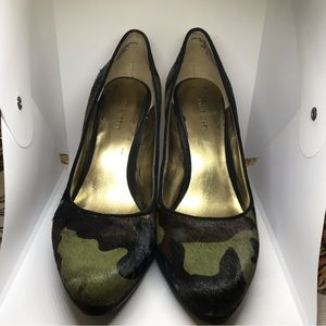Nine West cow leather textile upper. Color is a camo style.
